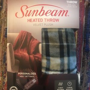 Sunbeam Heated Throw-Shades of blue.